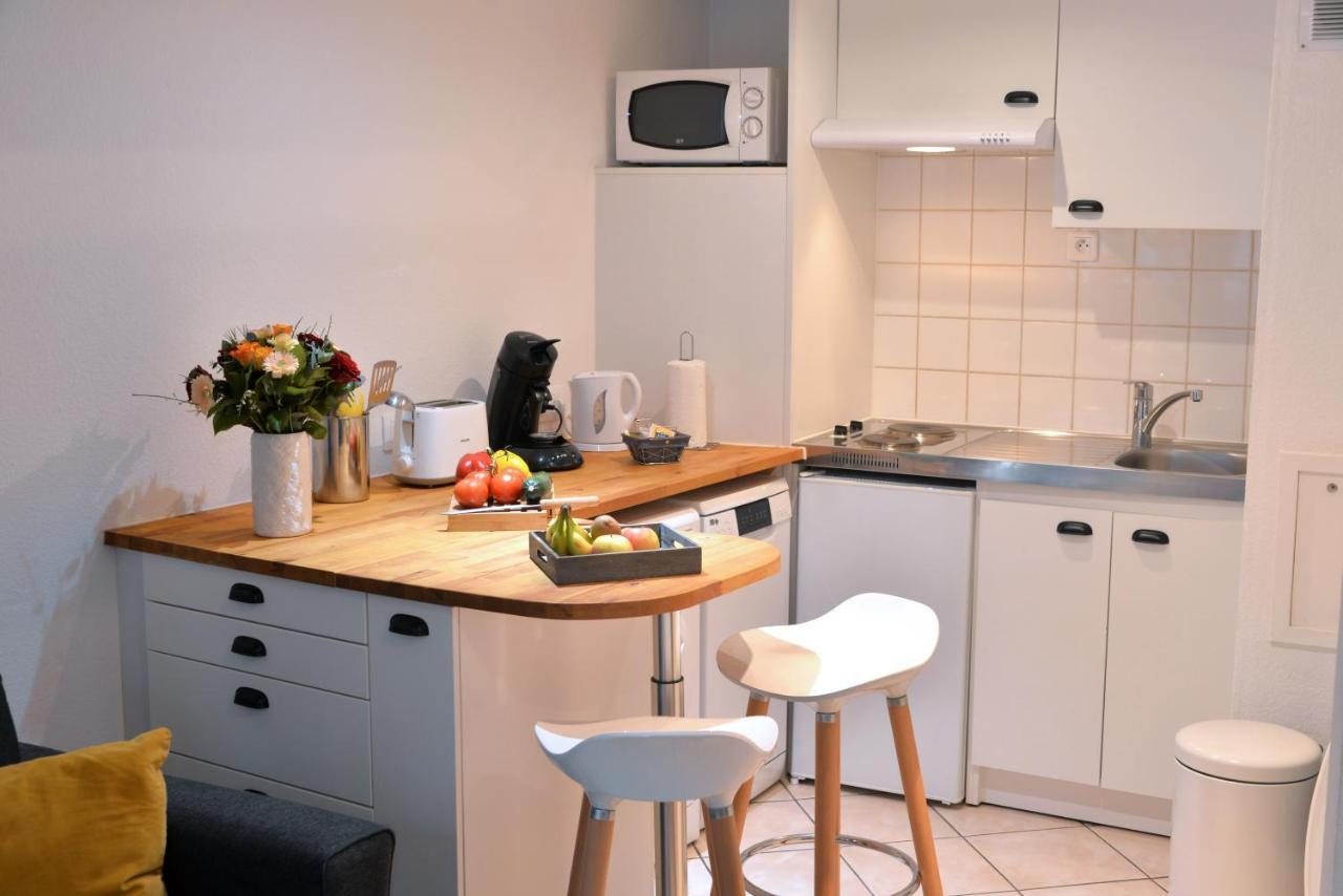 Appartement La Terrasse Sur Cour กอลมาร์ ภายนอก รูปภาพ