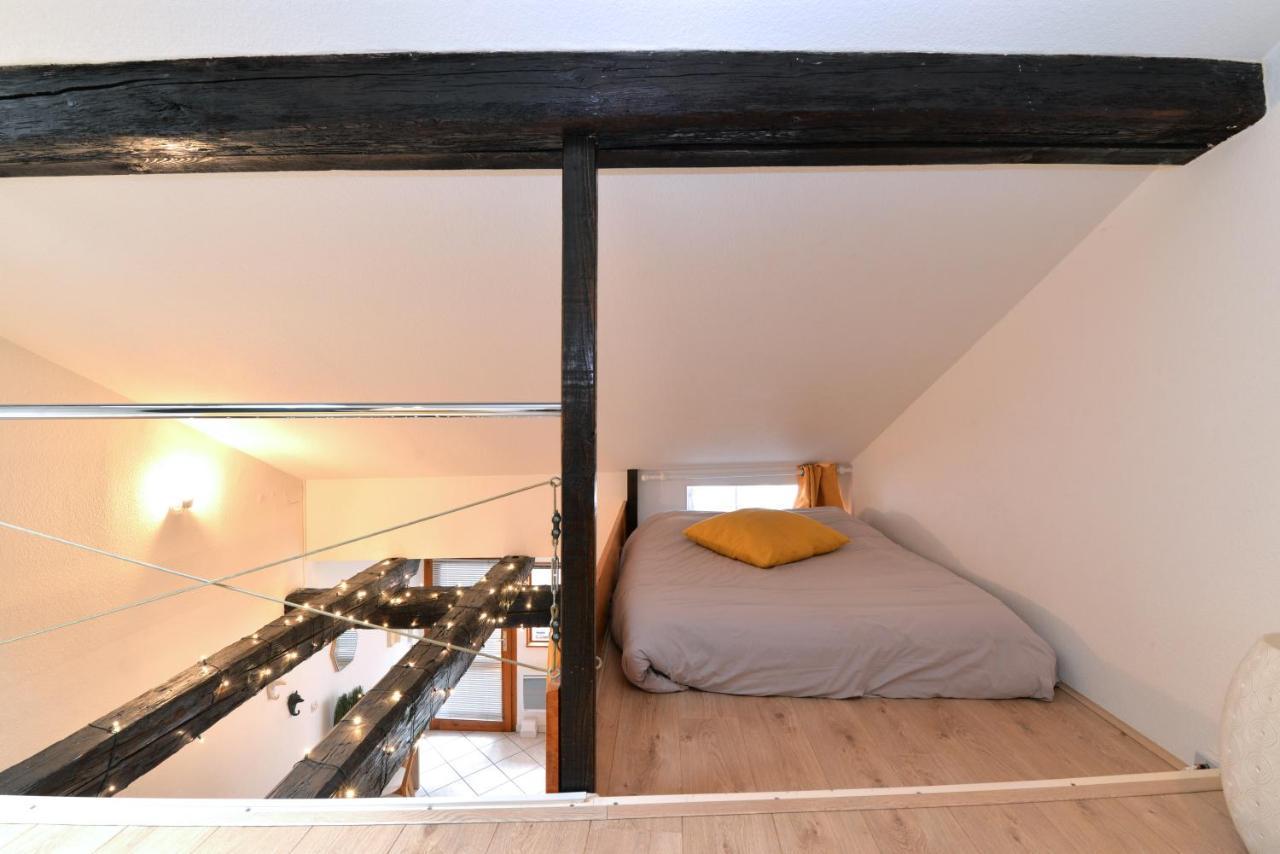 Appartement La Terrasse Sur Cour กอลมาร์ ภายนอก รูปภาพ
