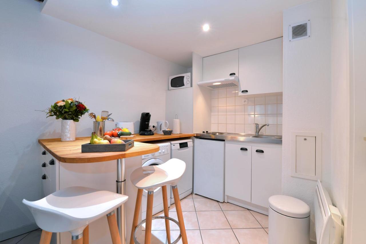 Appartement La Terrasse Sur Cour กอลมาร์ ภายนอก รูปภาพ