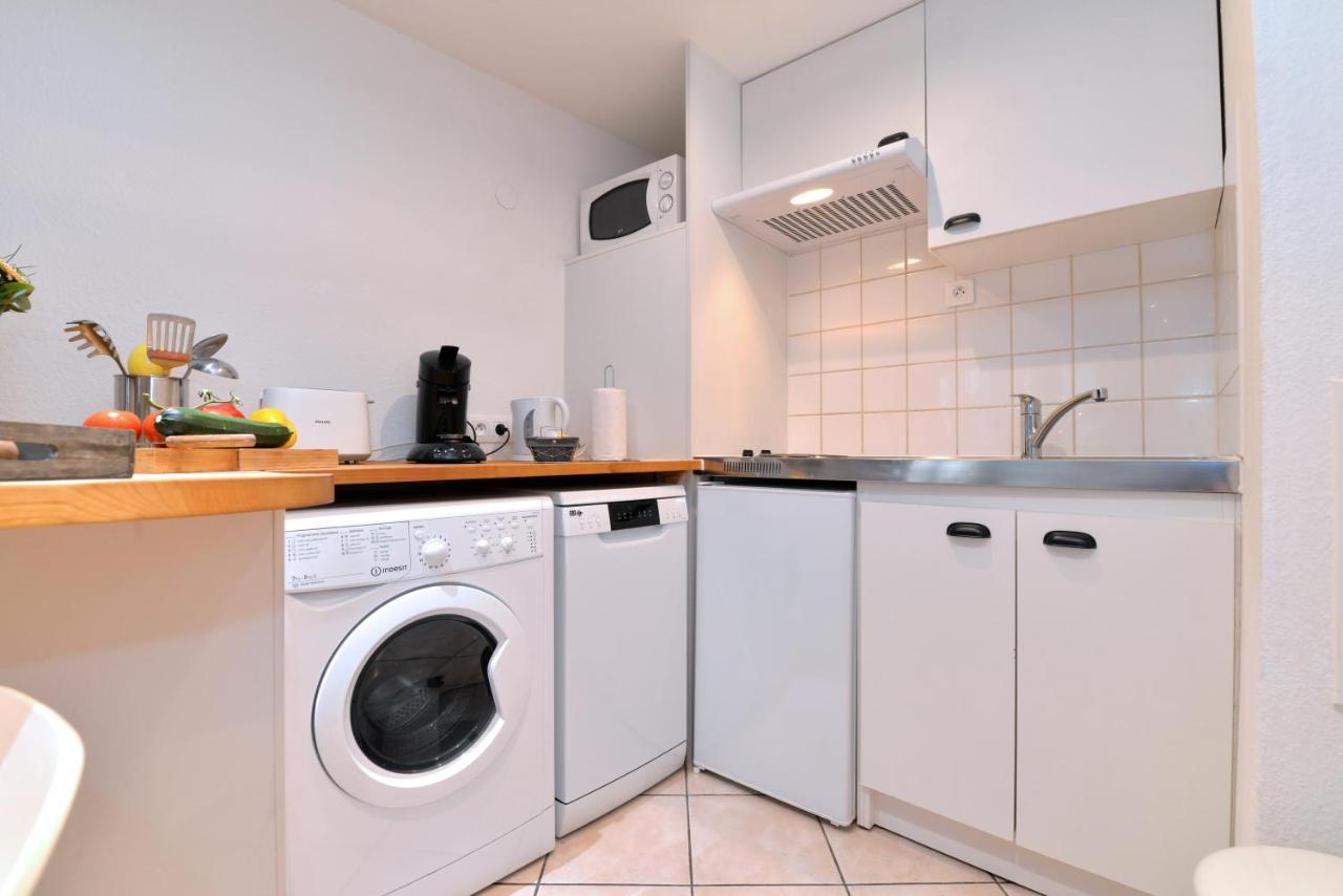Appartement La Terrasse Sur Cour กอลมาร์ ภายนอก รูปภาพ